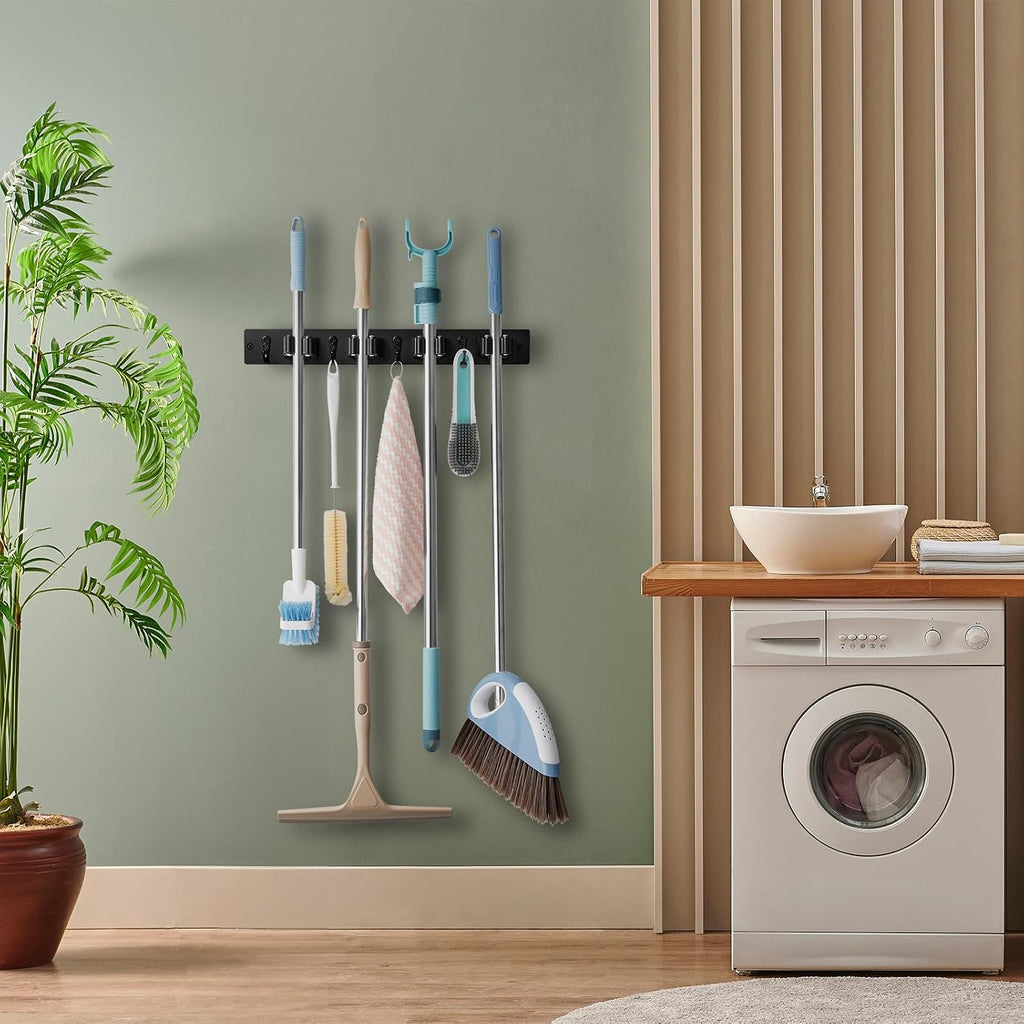 OUTNILI Black Mop Broom Holder Wall Mount with 4 Slots & 4 Hooks - Rustic Wood Broom Mop Hanger for Pantry Closet Laundry Room Organization - Heavy Duty Garden Tool Organizer - Black Kitchen Decor