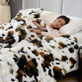 Cozy Bliss Cow Print Faux Fur Throw Blanket by CozyBliss