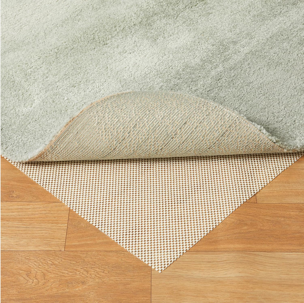 Amazon Basics Non-Slip Rug Pad, Keep Area Rugs Safe in Place, Slip and Skid Resistant Pads for Tile and Hardwood Floors, Protect Floors from Wear and Tear, Trimmable, 4x6