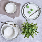 Sango 12-Piece Stoneware Dinnerware Set for 4, Modern White & Black Plates and Bowls Sets with Speckled Glaze, Durable Kitchen Ceramic Dish Set, Microwave & Dishwasher Safe Everyday Dishes, Stockholm
